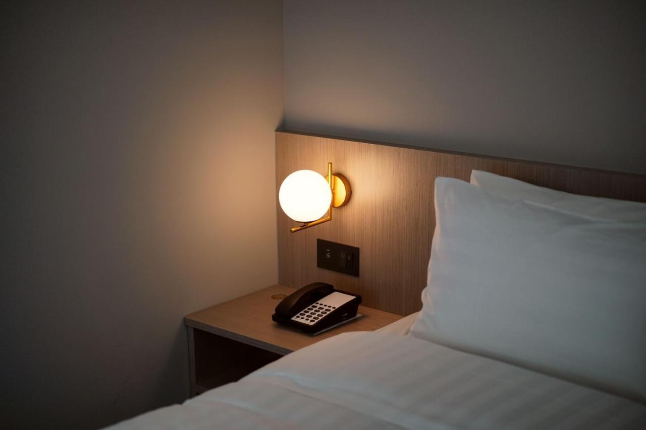 E Hotel Xinshi Eksteriør bilde